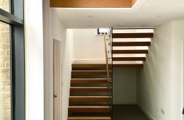 Cantilevered stairs with single centre glass. Ideal to maximise lightwell opening