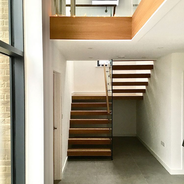 Cantilevered stairs with single centre glass. Ideal to maximise lightwell opening